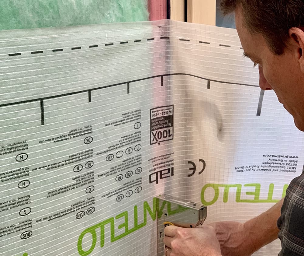 Intello Plus airtight membrane being installed — Proclima
