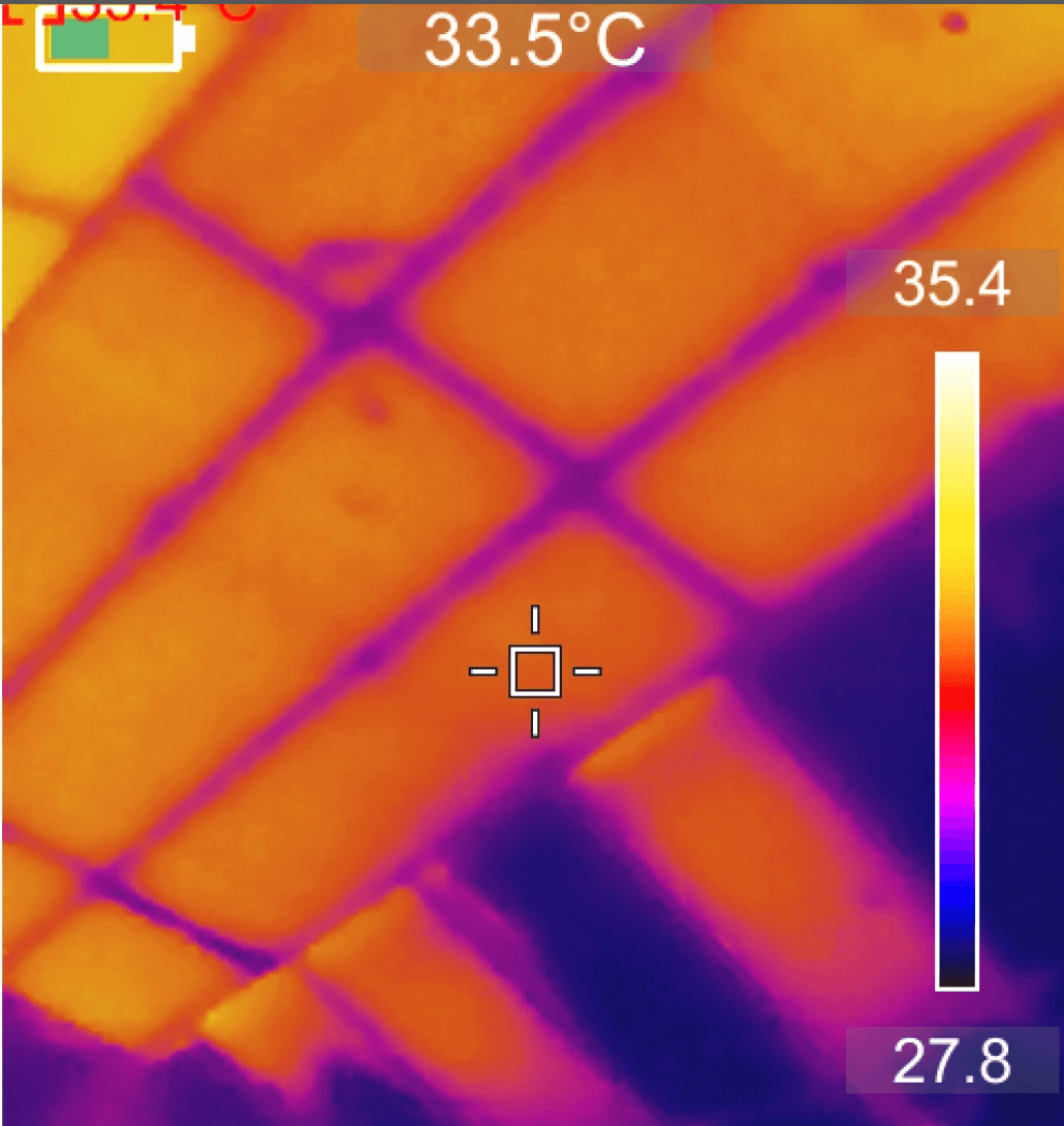 Thermal imaging showing a ceiling insulation gap — the kind of hidden defect that shows up as a leak in a blower door test